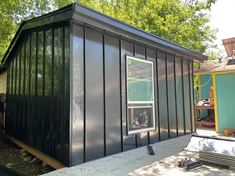 Black standing seam metal wall panels for Roof Inspection in La Cresta