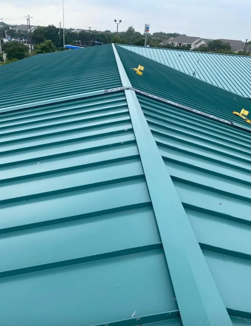 Green commercial metal roof ridge and valley for Metal Roof Repair in La Cresta