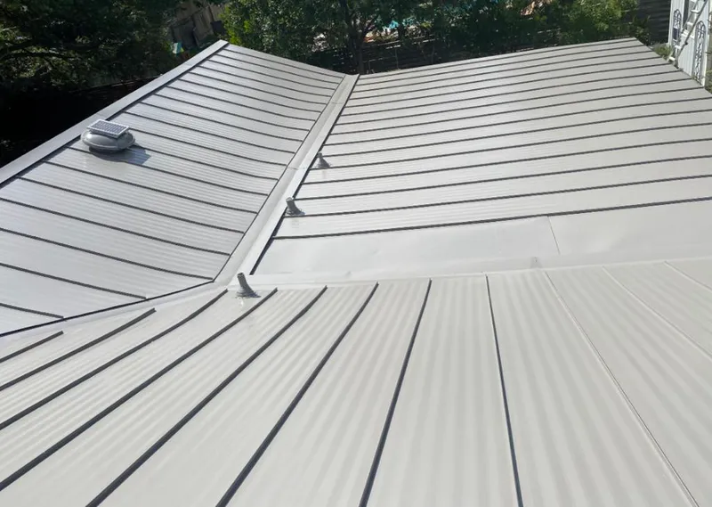Solar attic fan installed on a metal roof for Roof Ventilation in La Cresta
